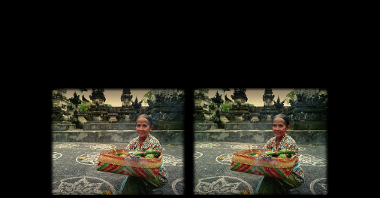 Stereophotograph of a woman carrying a colourful basket with flowers. A stony monument as a background.